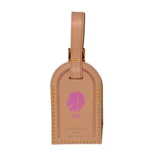 AUTH & RARE Louis Vuitton LEO luggage tag!